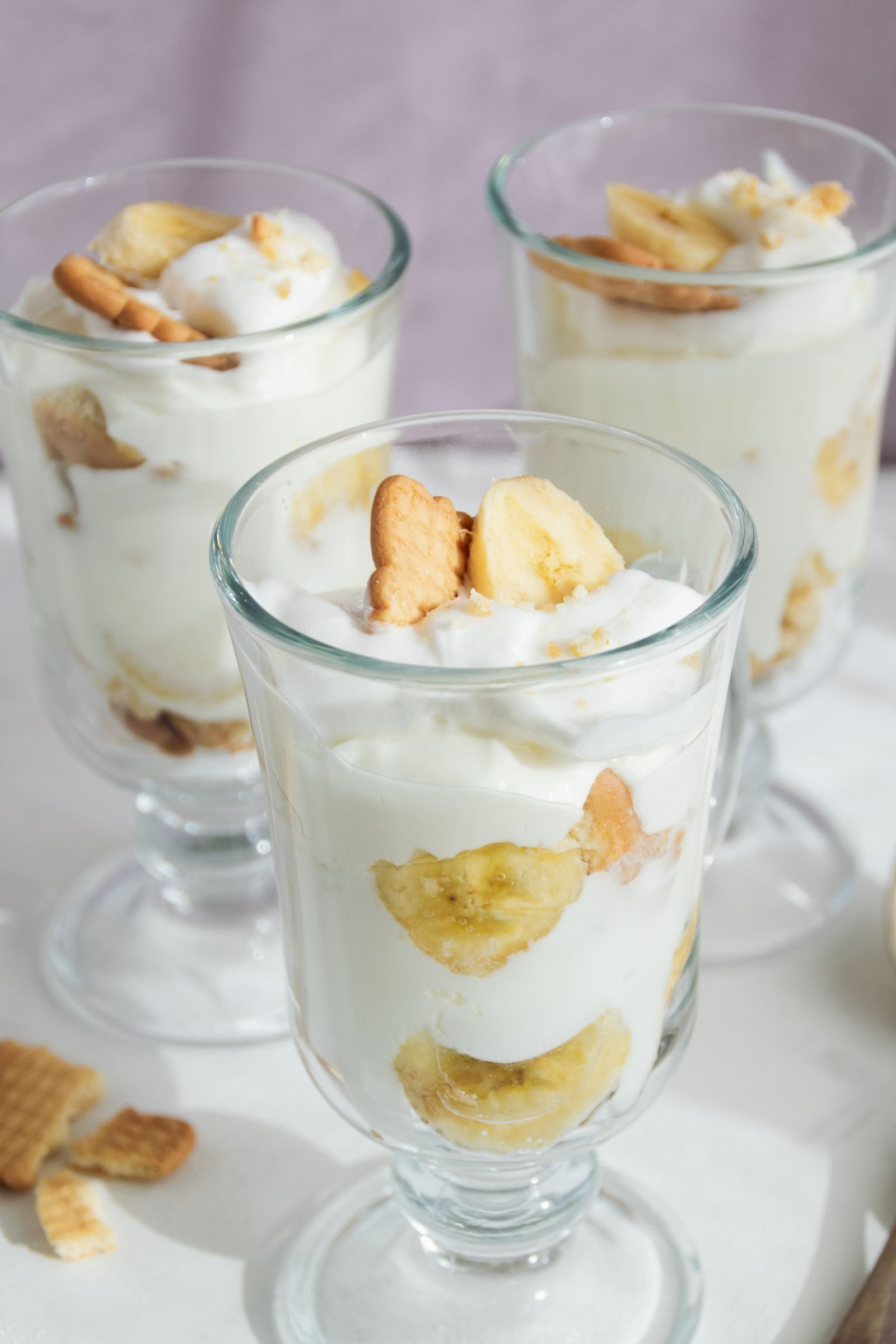 Individual glasses of Southern banana pudding layered with wafers and bananas